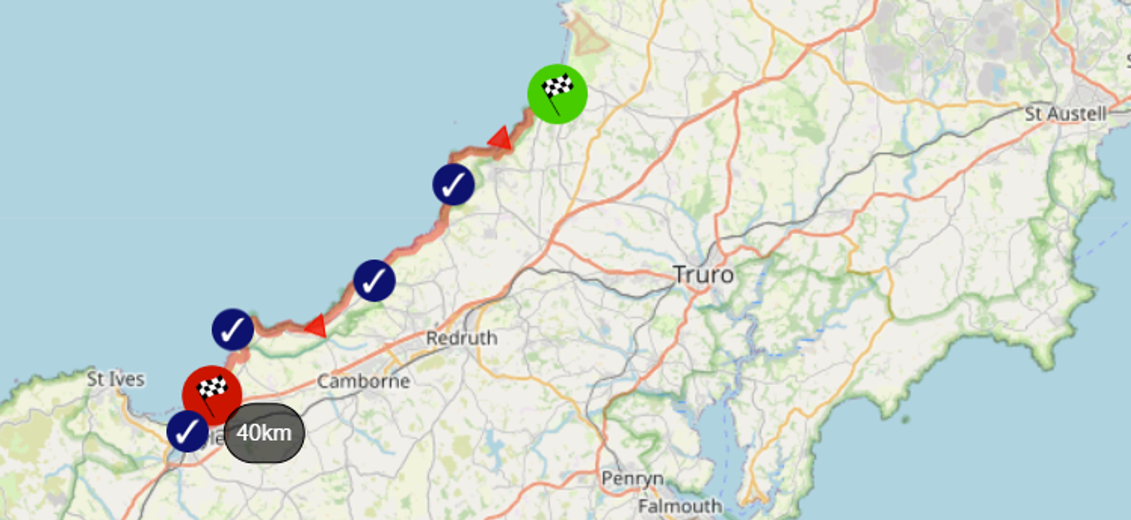 A map illustrating a route in Cornwall, UK. It starts at the north coast and heads southwest, passing through areas such as Camborne. The route is marked in red with check points, indicating a 40km journey.