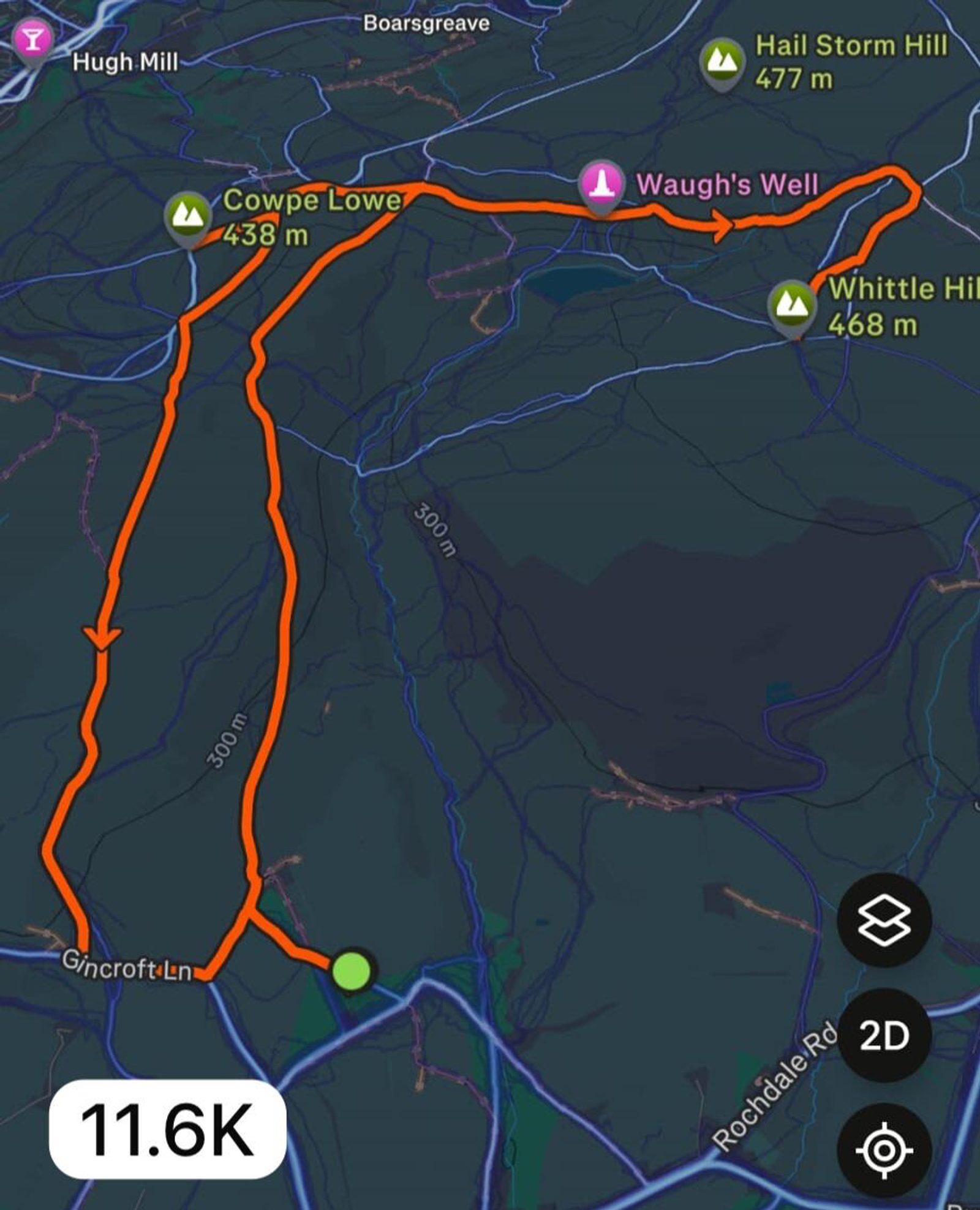 A map screenshot showing an 11.6 km walking route looping past Cowpe Lowe, Waugh’s Well, and Gincroft Lane, with elevation markers for nearby hills and orange lines indicating the path. Map controls are visible in the corners.