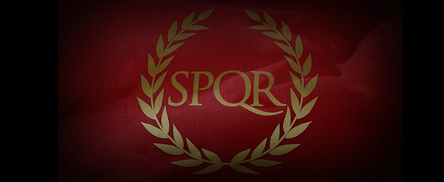 A red flag with gold laurel leaves encircling the letters "SPQR," an abbreviation symbolizing the government of ancient Rome.